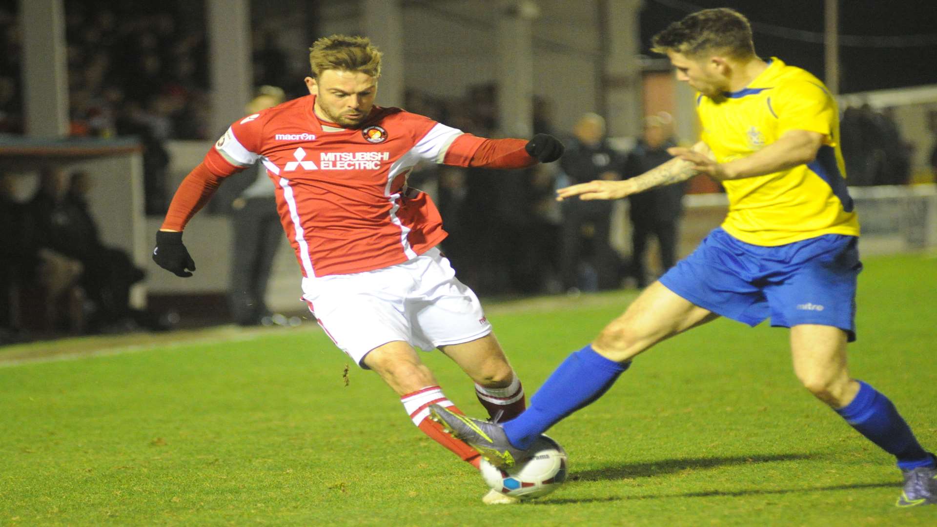 Matt Godden finds his path blocked down the Ebbsfleet right Picture: Steve Crispe