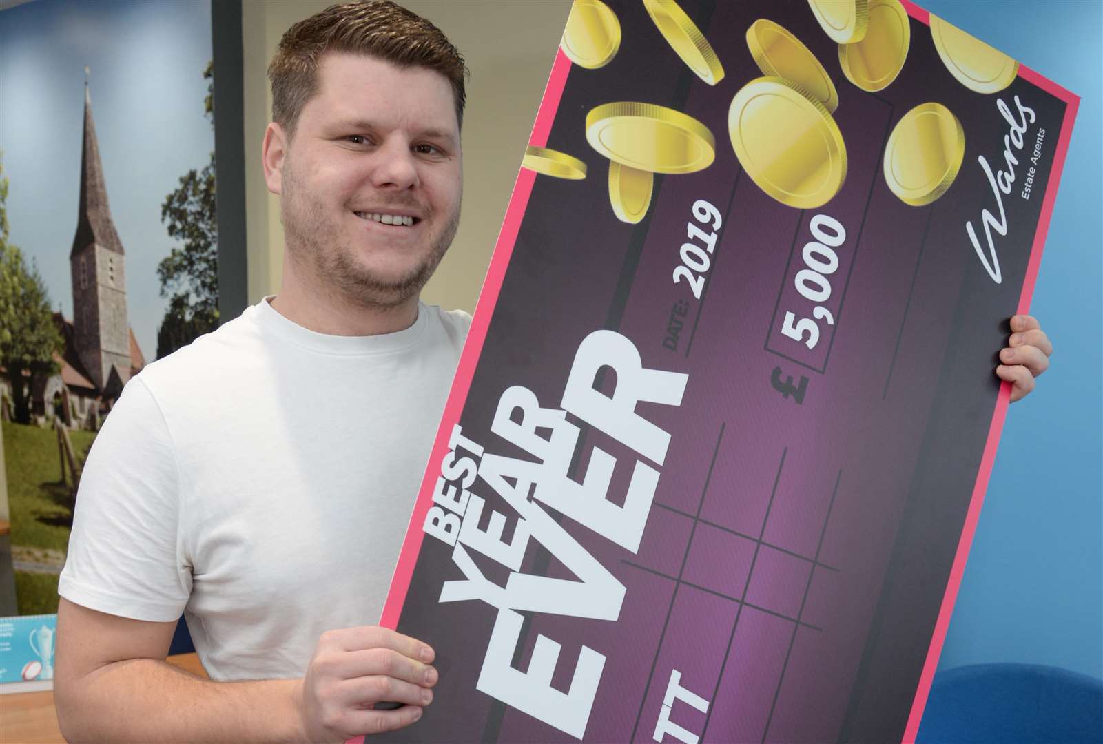 Charlie Bott from Margate with his cheque for £5000 from KMFM at Wards in Birchington on Sunday. Picture: Chris Davey. (7238551)