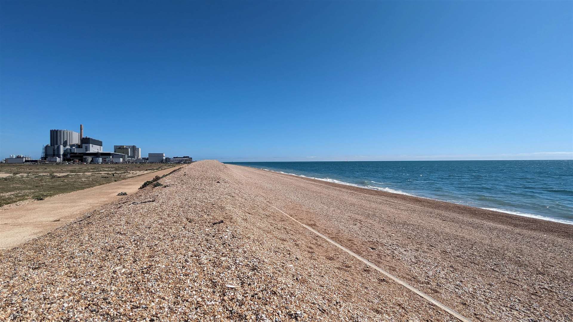 The view along the beach towards the nuclear power station