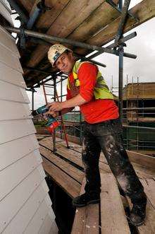 Caleb Watson has successfully finished the weatherboarding on the Sheerness Windmill, which was officially overseen by the Mayor of Swale