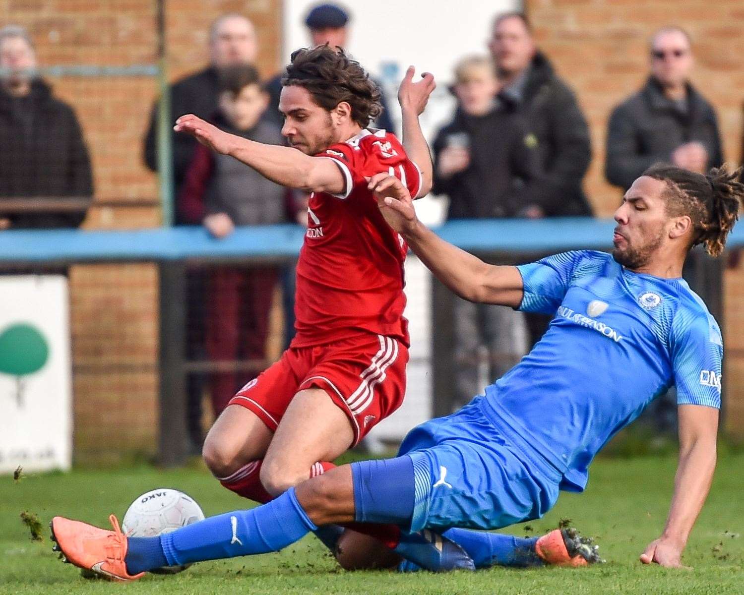 Welling's Bradley Goldberg is fouled by Billericay defender Michael Chambers. Picture: Dave Budden (31656989)