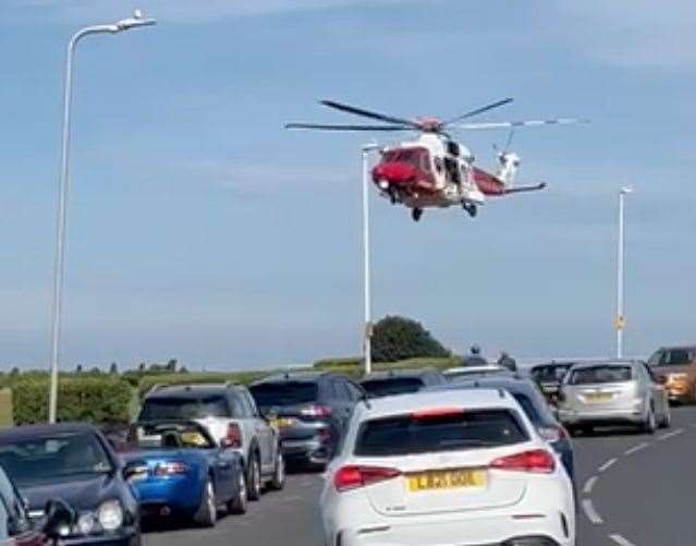 The coastguard helicopter landed next to a busy road while at a medical incident in Westgate-on-Sea. Picture: Stuart Cook