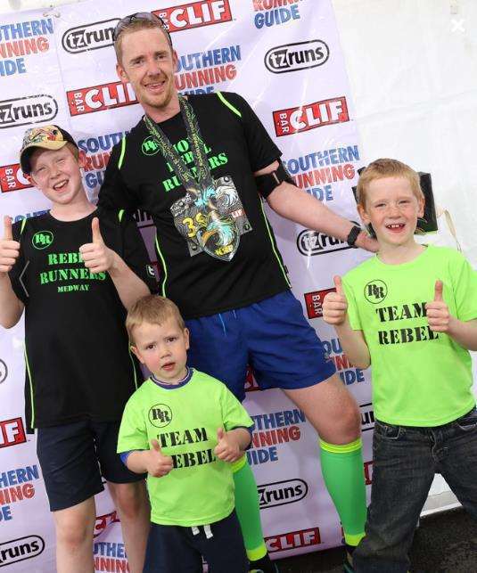 Celebrating at the end of the Kent Roadrunner with his sons