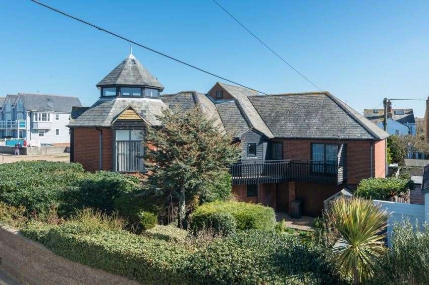 The house and garden are surrounded by Whitstable's sea wall. Picture: Woodward and Bishopp