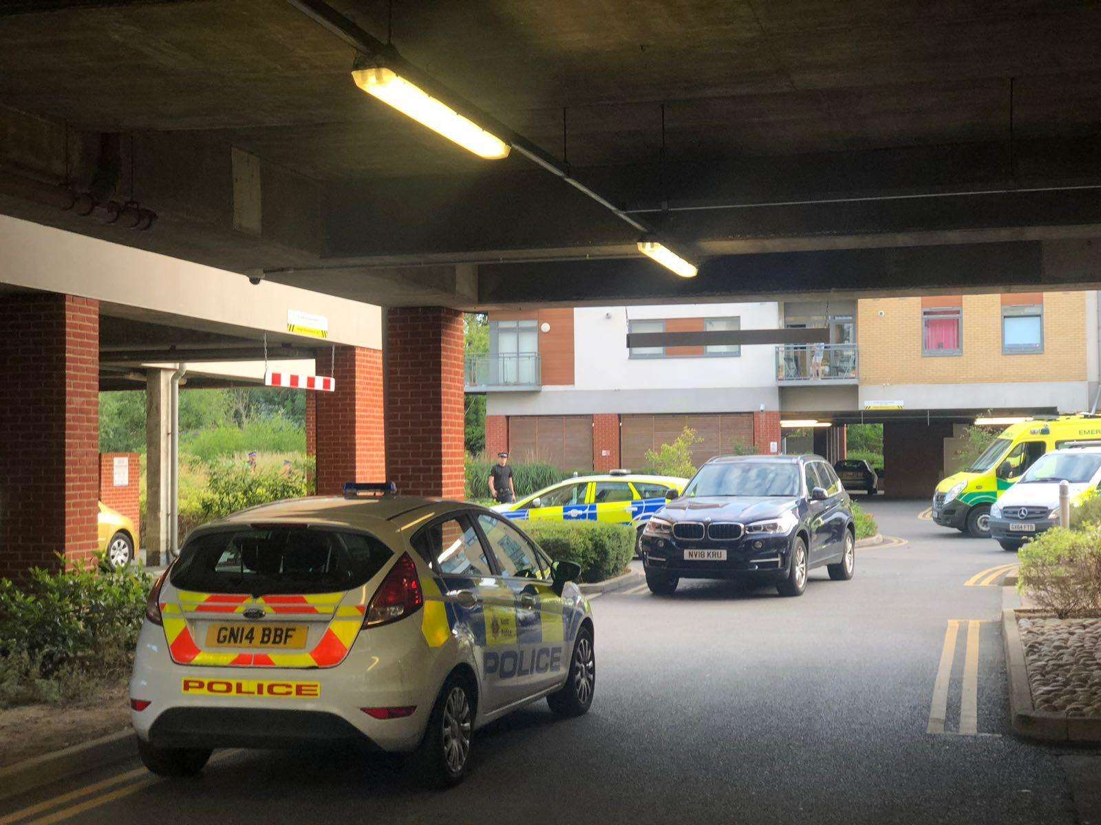 Four police cars and three ambulances were seen at Wallis Place flats off Hart Street in Maidstone