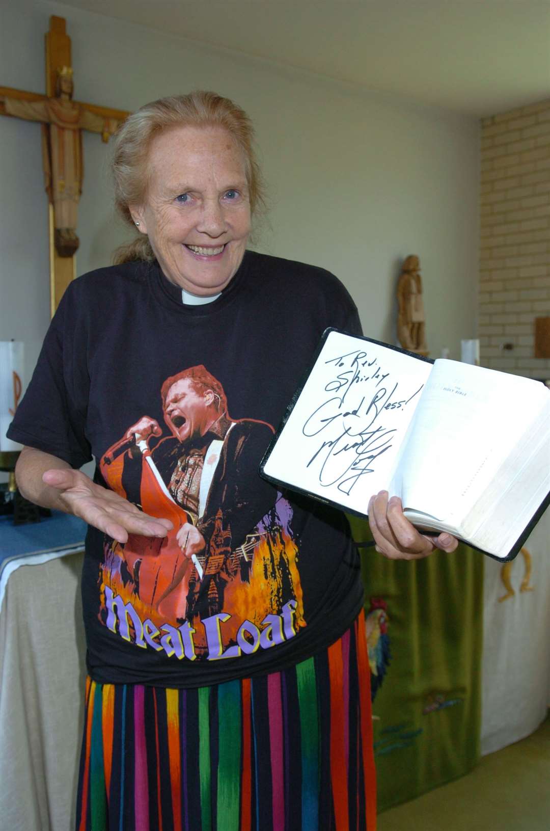 Rev Shirley Birch of St. Peter's Church, Halfway, Sheerness with her Meatloaf tee-shirt and autographed bible