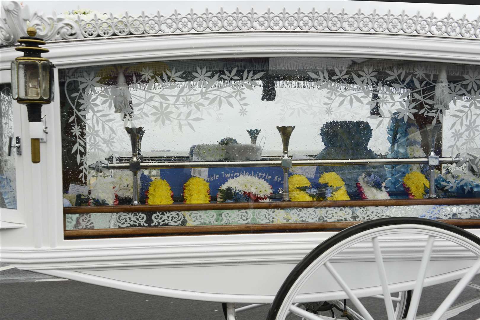 The procession for baby Luchii Gavrilescu, led by a horse-drawn hearse, makes its way along the seafront. Picture: Paul Amos.