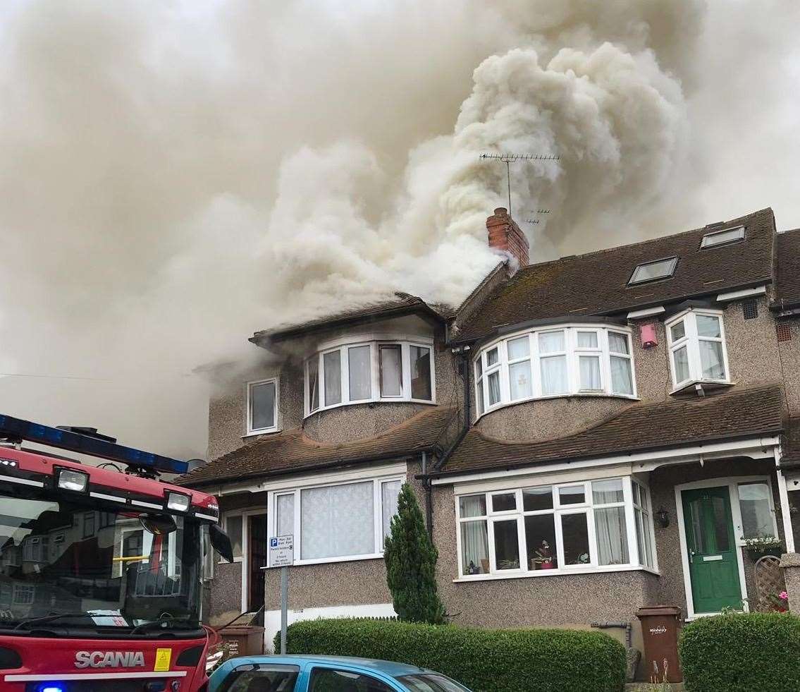 Smoke billows from the roof of the property. Pic: Khalid Lone (13493065)