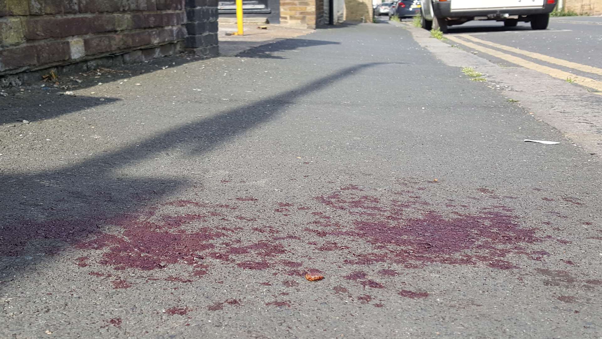 A pool of blood on the pavement in Charles Street