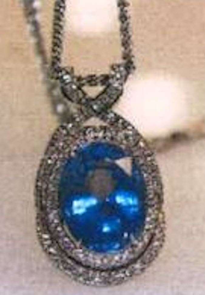 White gold diamond and sapphire pendant stolen from a home in Sevenoaks. Picture: Kent Police