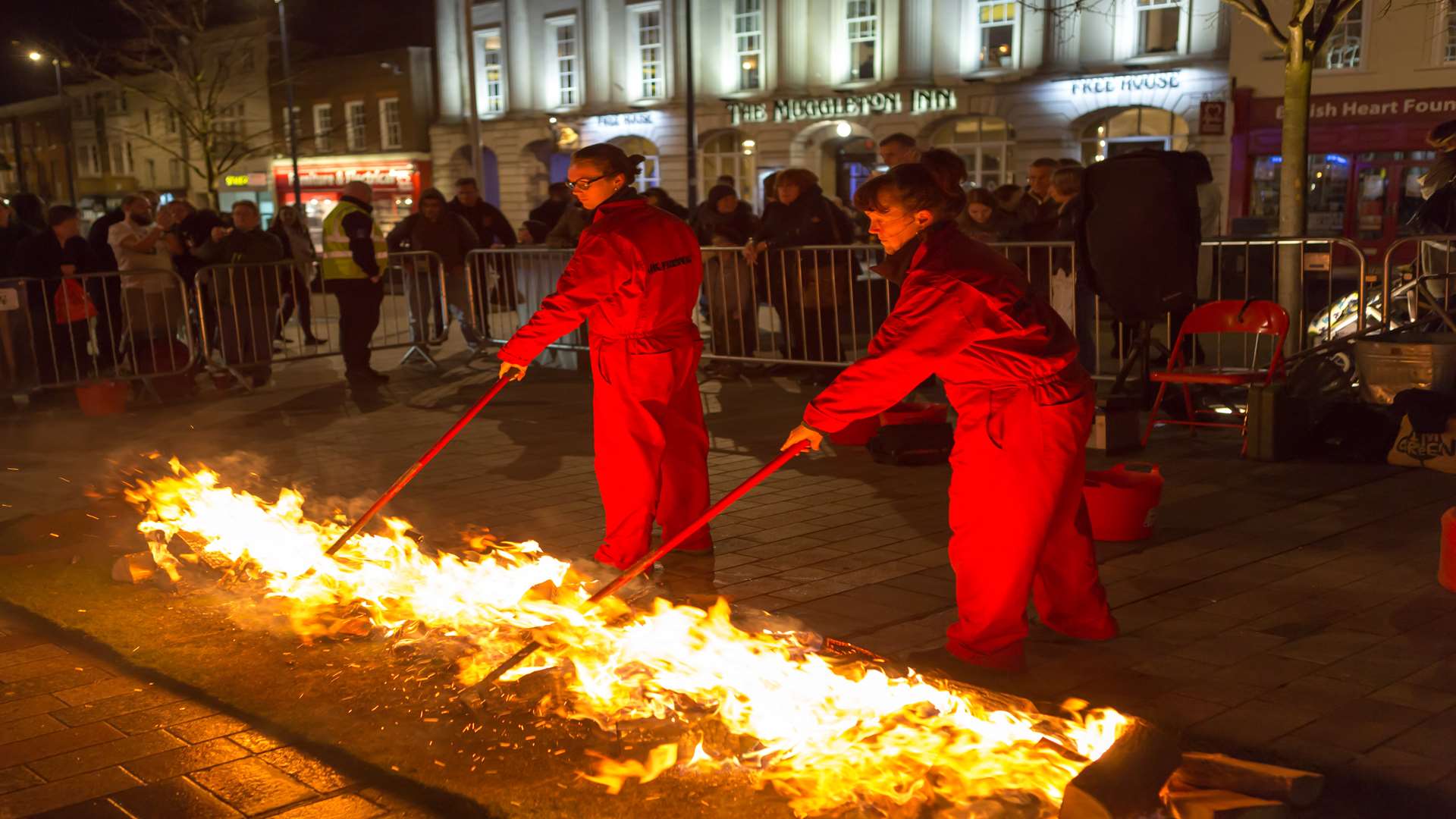 UK Firewalk stoke the coals.