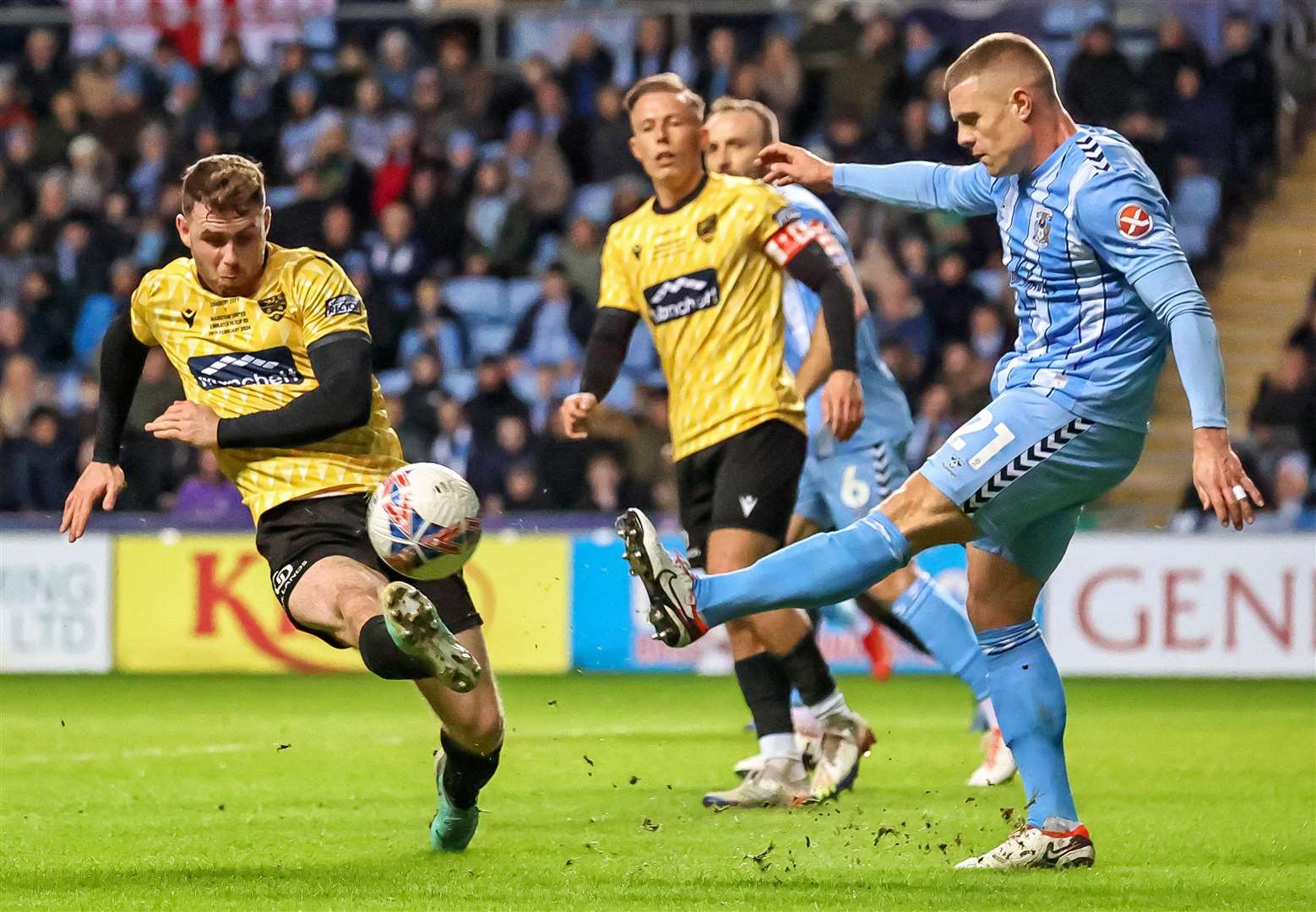 Maidstone's George Fowler closes down a Coventry clearance. Picture: Helen Cooper