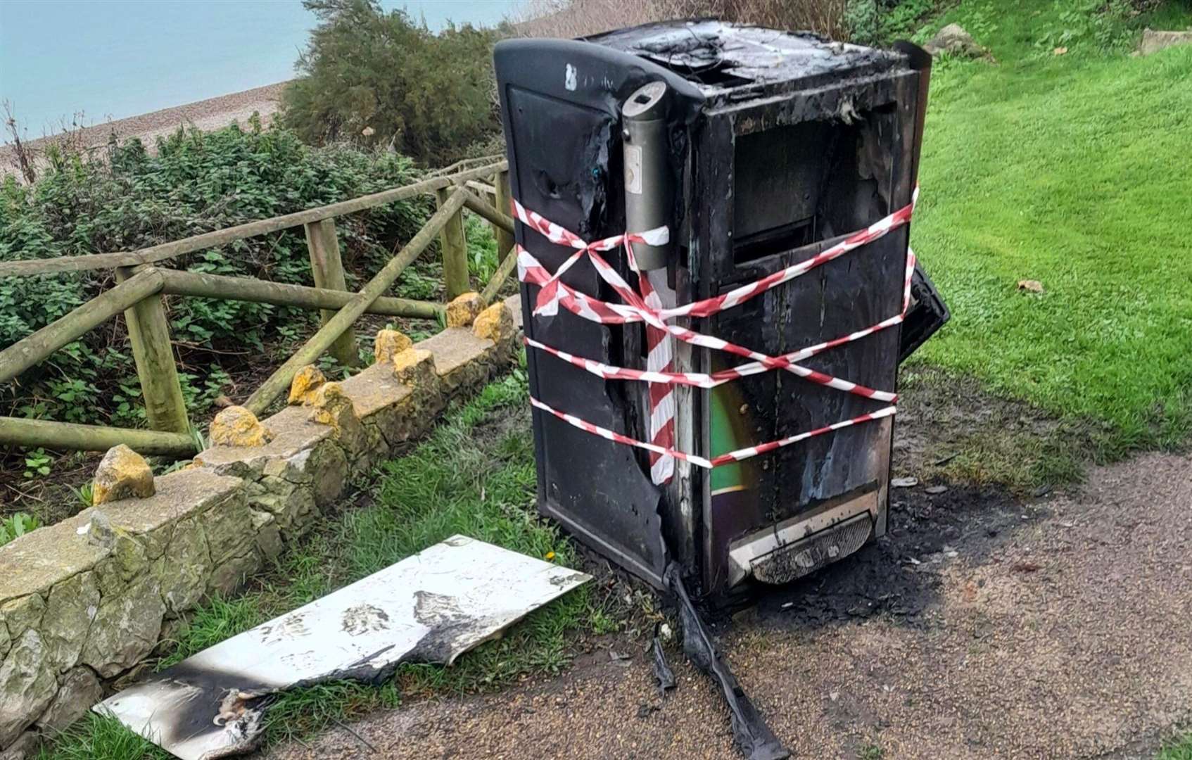 The burnt bin in the Lower Leas Coastal Park, Folkestone, cost £5,000 to install. Picture: FHDC