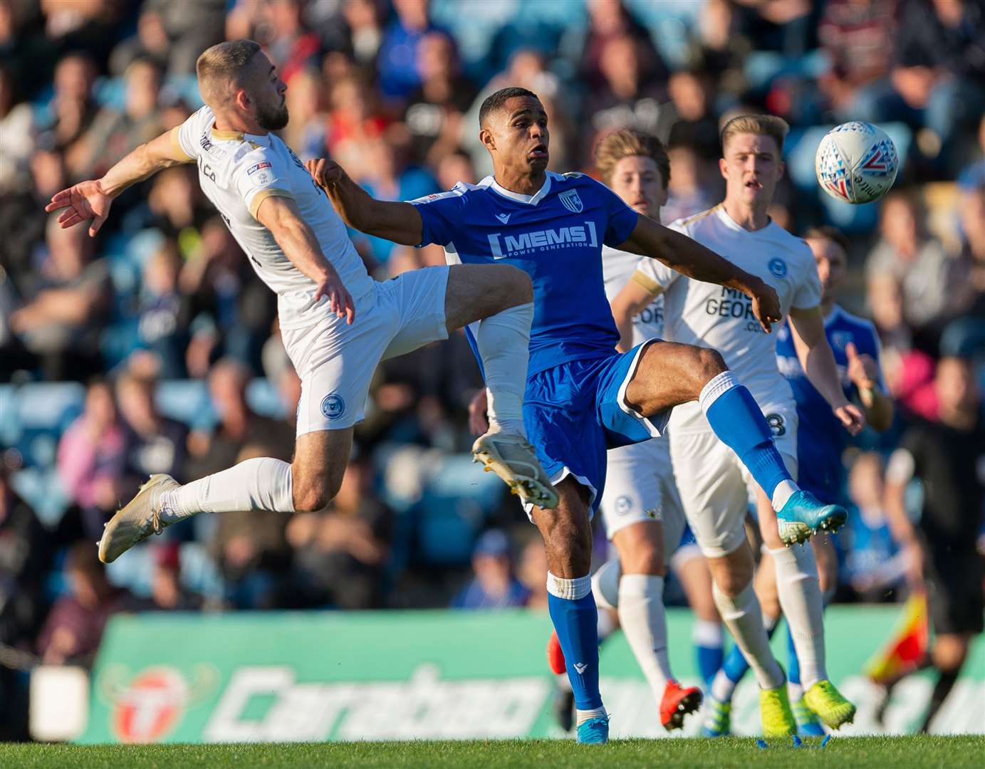 Mikael Mandron is challenged by Peterborough's Dan Butler Picture: Ady Kerry