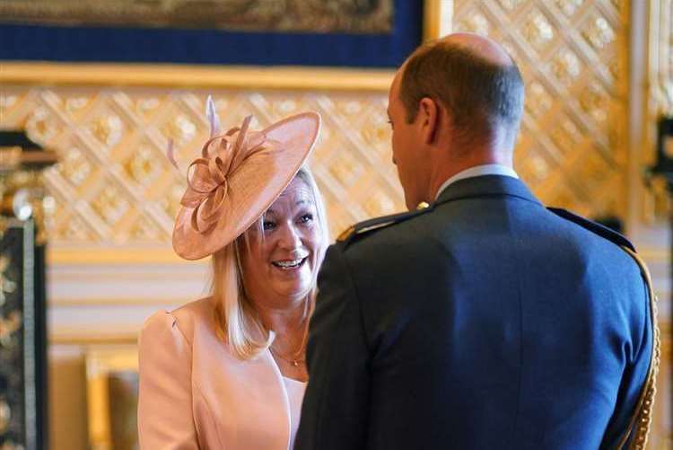 Paula Hudgell is made an OBE by the Prince of Wales at Windsor Castle (Yui Mok/PA)