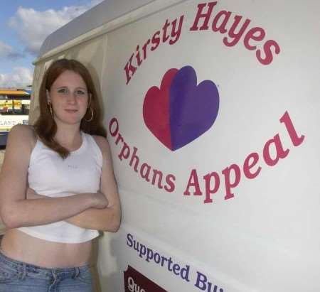 Kirsty Hayes beside the signwritten van she will be filling with toys for children in a Romanian orphanage. Picture: CHRIS DAVEY