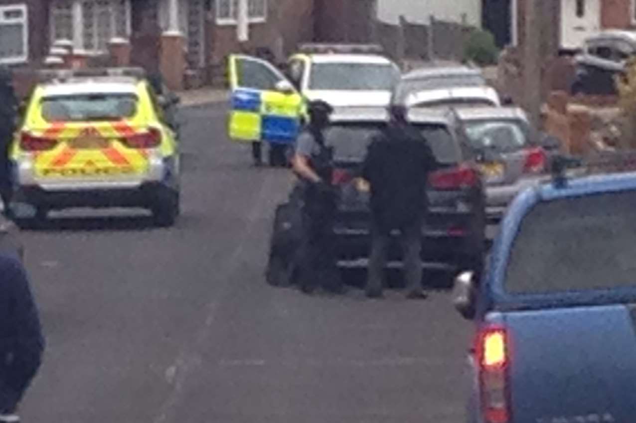 Armed police in the street