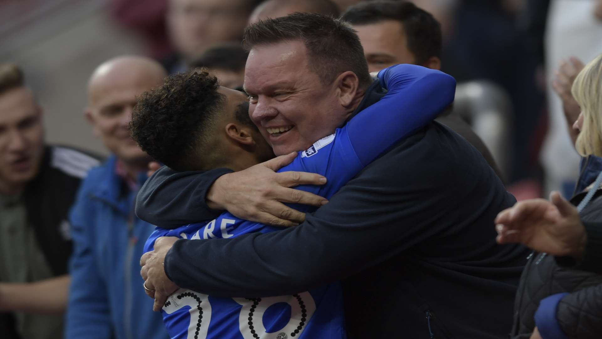 Sean Clare celebrates a crucial three points with a fan Picture: Barry Goodwin