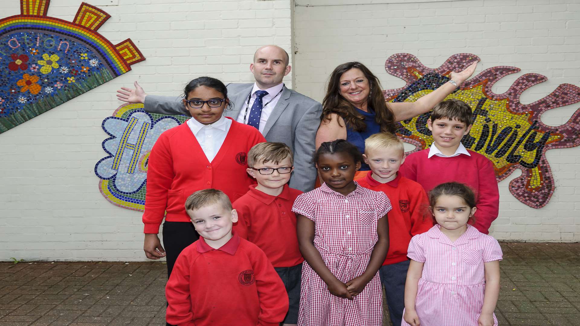 Chris Jackson, head of school to be, and consultant Catherine Taylor with pupils from the school.