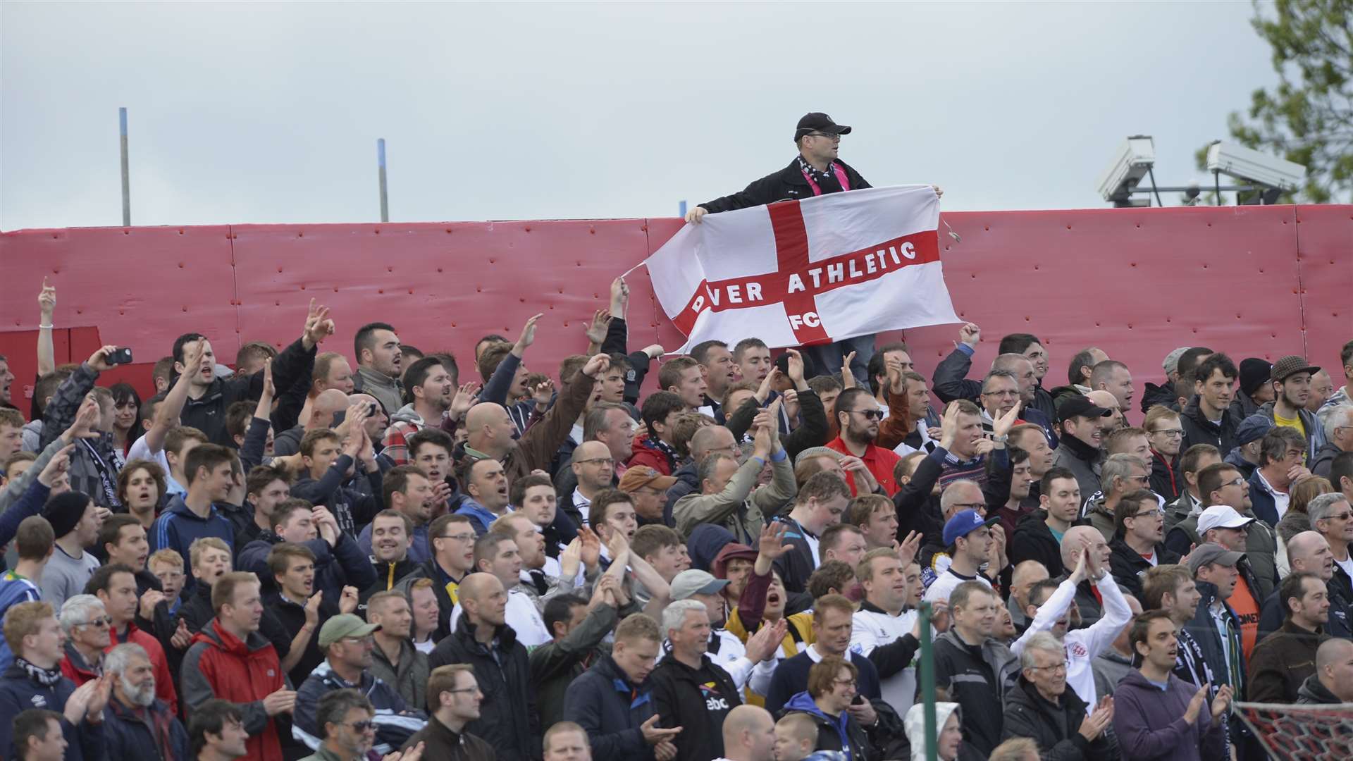 Dover fans celebrate after the game