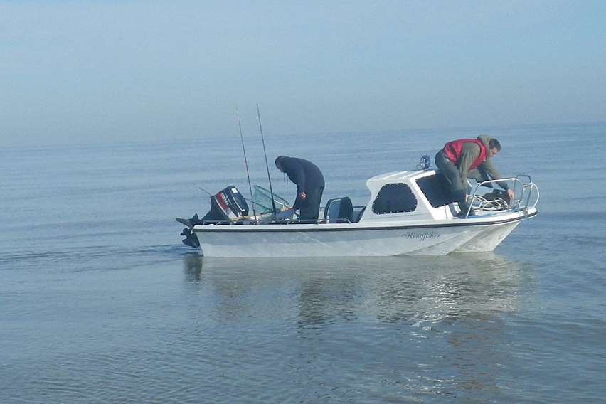 The pair on the angling boat wait for help. Picture courtesy of Whitstable RNLI