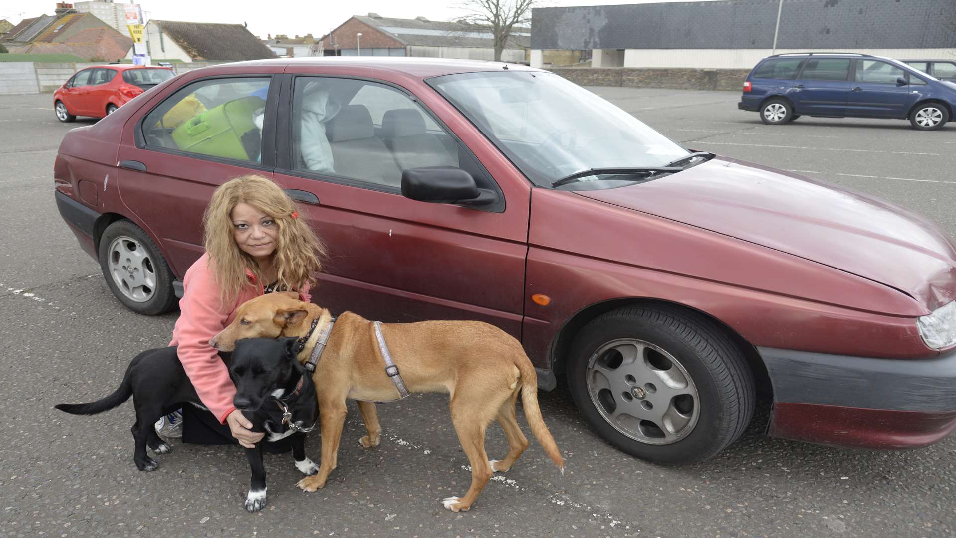 Hillary Barrows outside her Alfa Romeo. Picture: Chris Davey