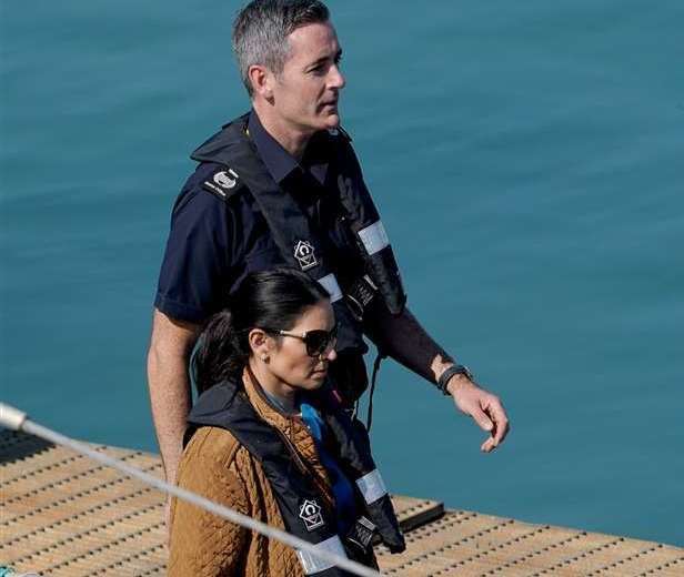 Home Secretary Priti Patel with Dan O’Mahoney, Clandestine Channel Threat Commander, at the Border Force facility in Dover. Photo: Gareth Fuller/PA