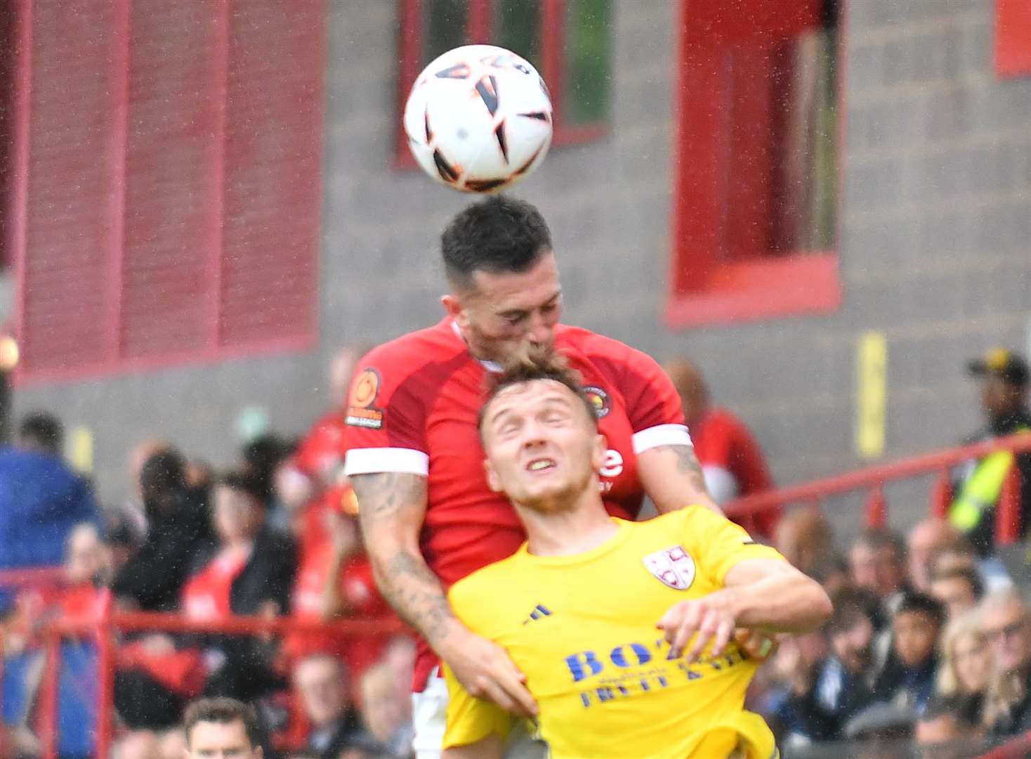 Ebbsfleet defender Lewis Page wins an aerial dual during the first half. Picture: Ed Miller / EUFC