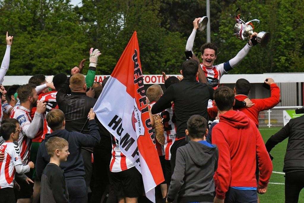 Captain Billy Bennett lifts the SCEFL Challenge Cup Picture: Marc Richards