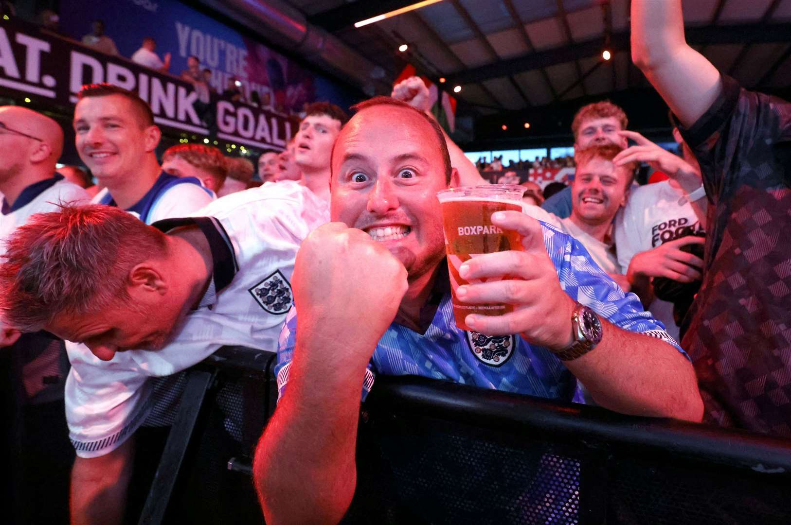 Fans celebrate during England's semi-final victory with Holland. Picture: Nigel French/PA