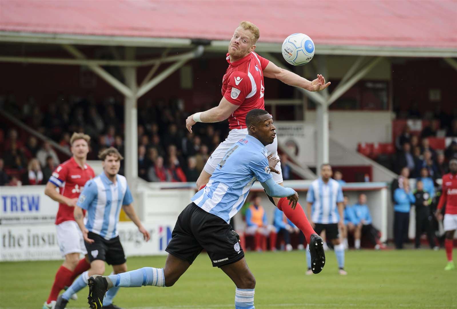 Dave Winfield looks on as Kenny Clark wins this header against Hampton & Richmond Picture: Andy Payton