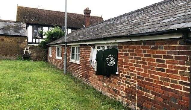 The first thing I saw out back was a couple of Stella T-shirts drying alongside a selection of dishcloths