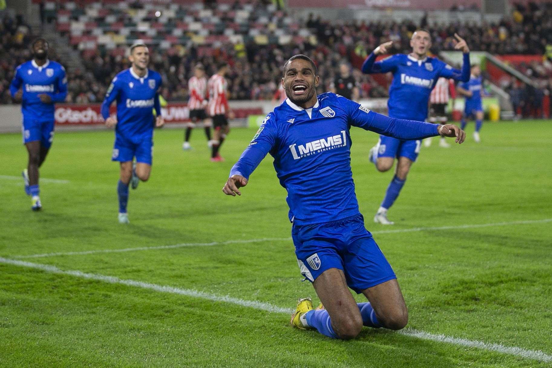 Goalscorer Mikael Mandron celebrates in front of the Gillingham masses. Picture: KPI