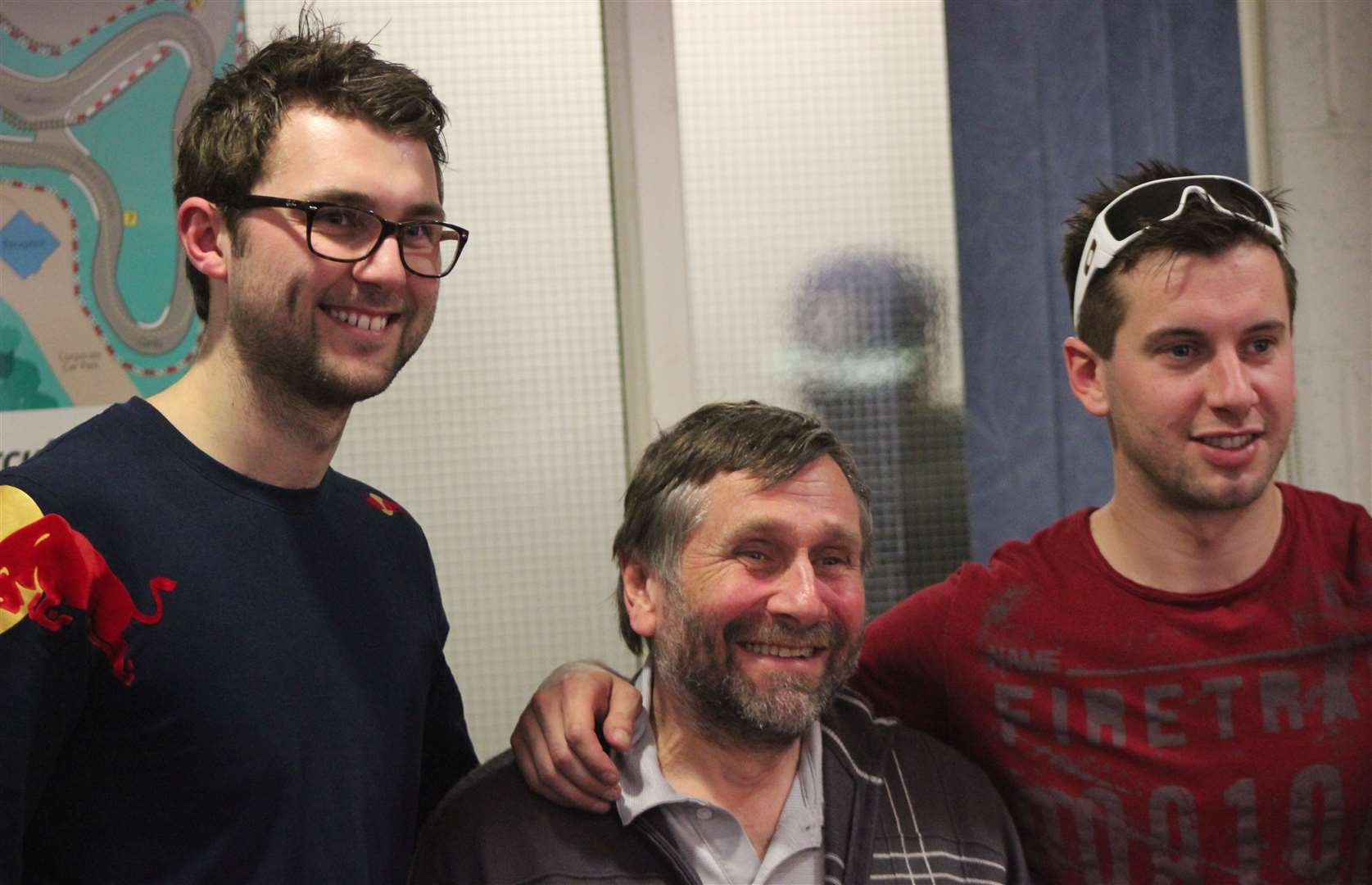 Andrew Jordan with Dave and Chris Scott at the Ryan Lawford memorial event in 2014. Picture: Joe Wright