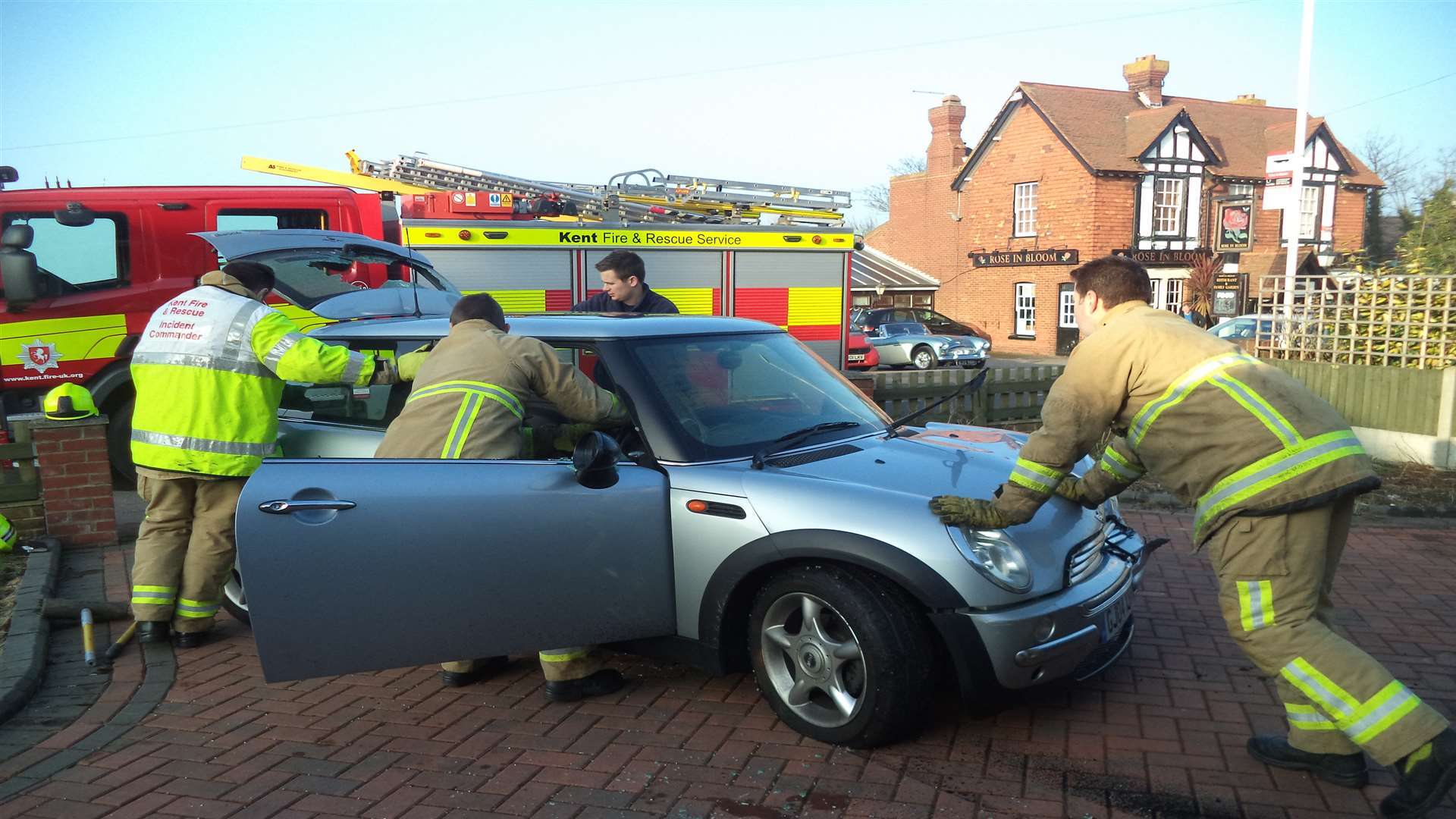 Firefighters deal with the aftermath of the crash