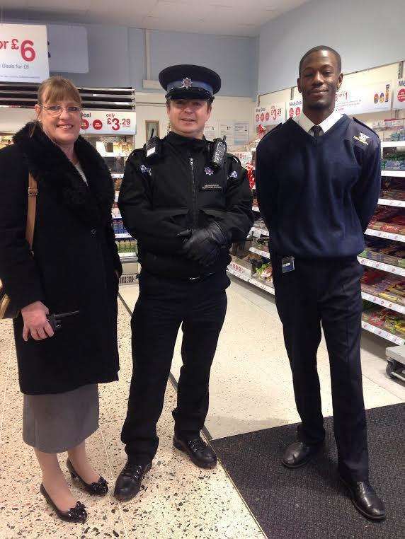 Karen Griffiths with PSCO Chris Chapman and security guard at Boots, Seun Akerele