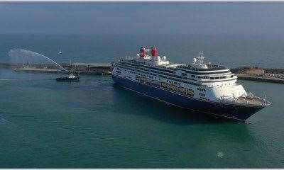 Farewell spray from a tug as Bolette starts its maiden voyage. Picture: Port of Dover