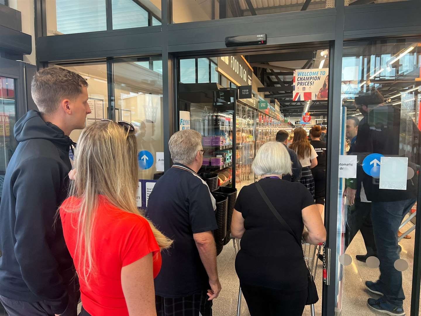 The first shoppers queuing outside the new Aldi store in Queenborough