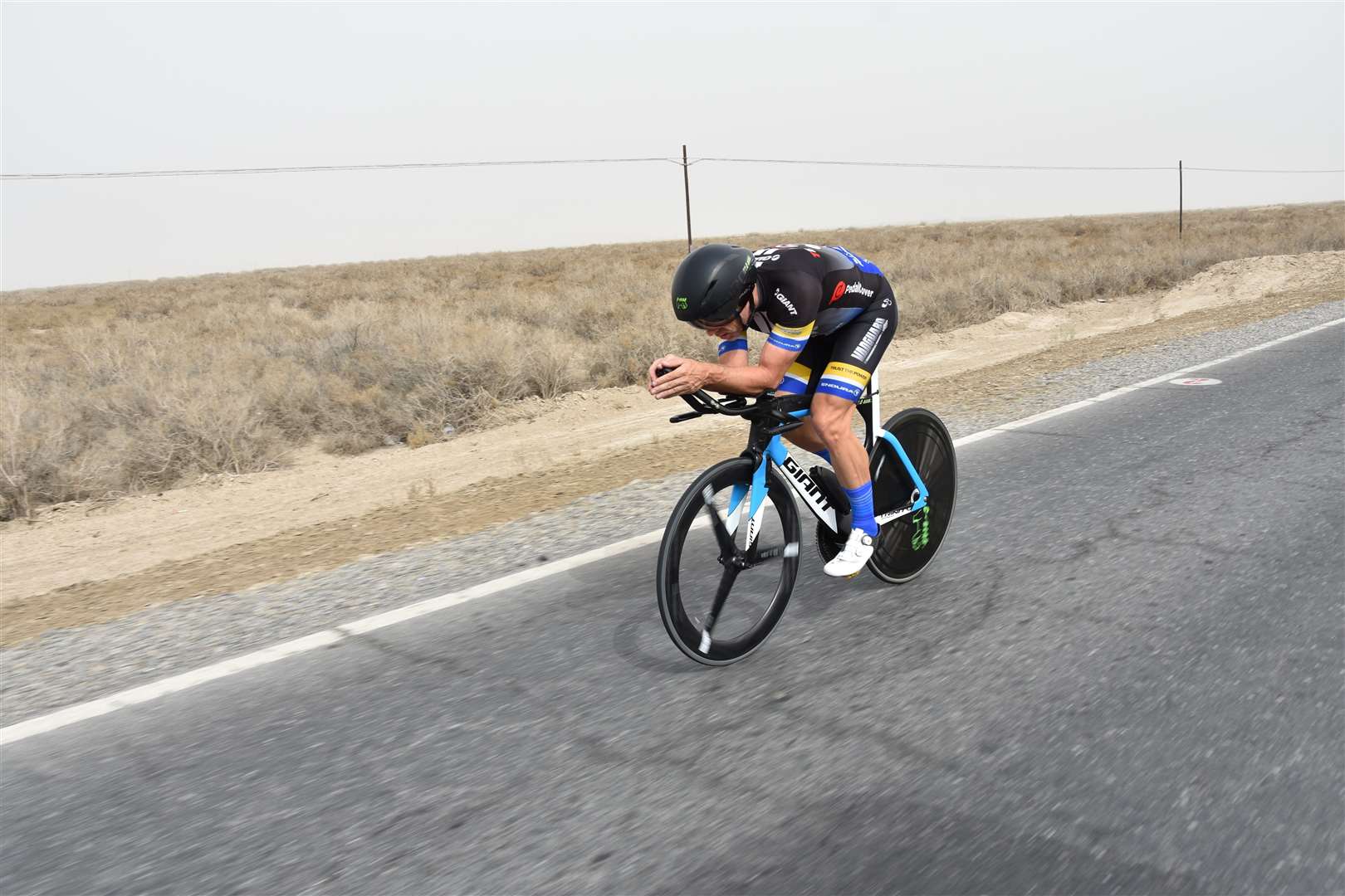 Jonathan Parker cycling through the Taklamakan Desert. Picture: Ollie Tindall (9883821)