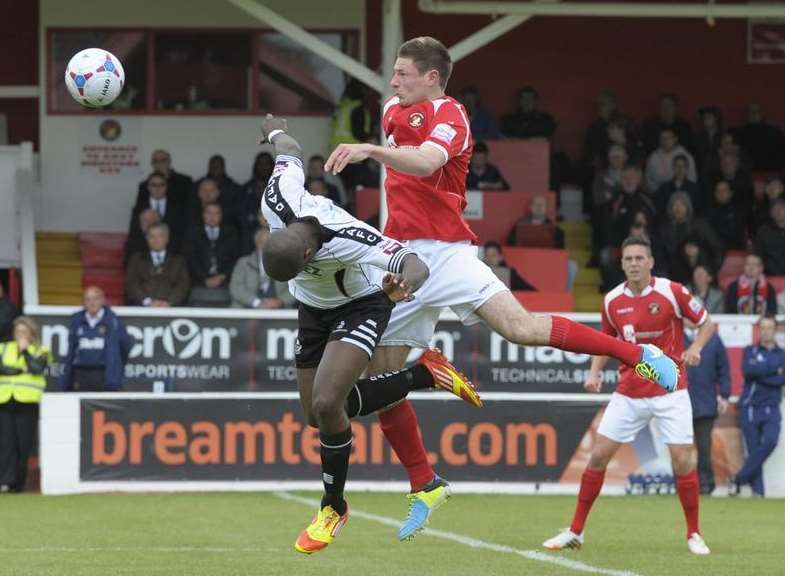 Paul Lorraine gets the better of Dover's Nathan Elder Picture: Andy Payton