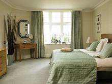 A bedroom at Champneys' Resort