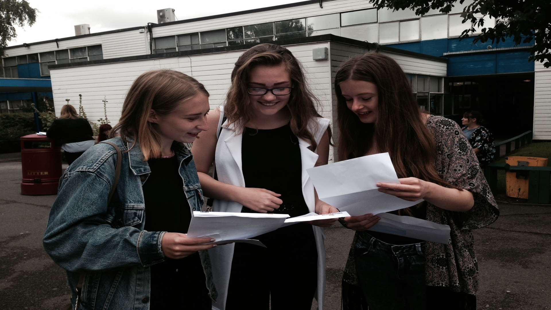 SCC students Shannon Baker, Alix Hadley and Charlotte Crossley, all 16, opening their results