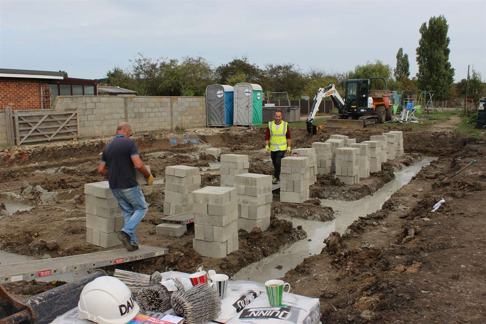 Workers at the site on Monday afternoon