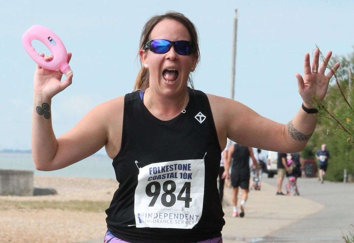 Lenni Frampton is all smiles during the Folkestone Coastal 10K on Sunday.