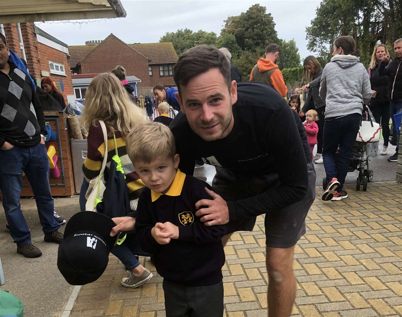 Proud dad David Ashworth with son Oliver on his first day of school. (17691235)