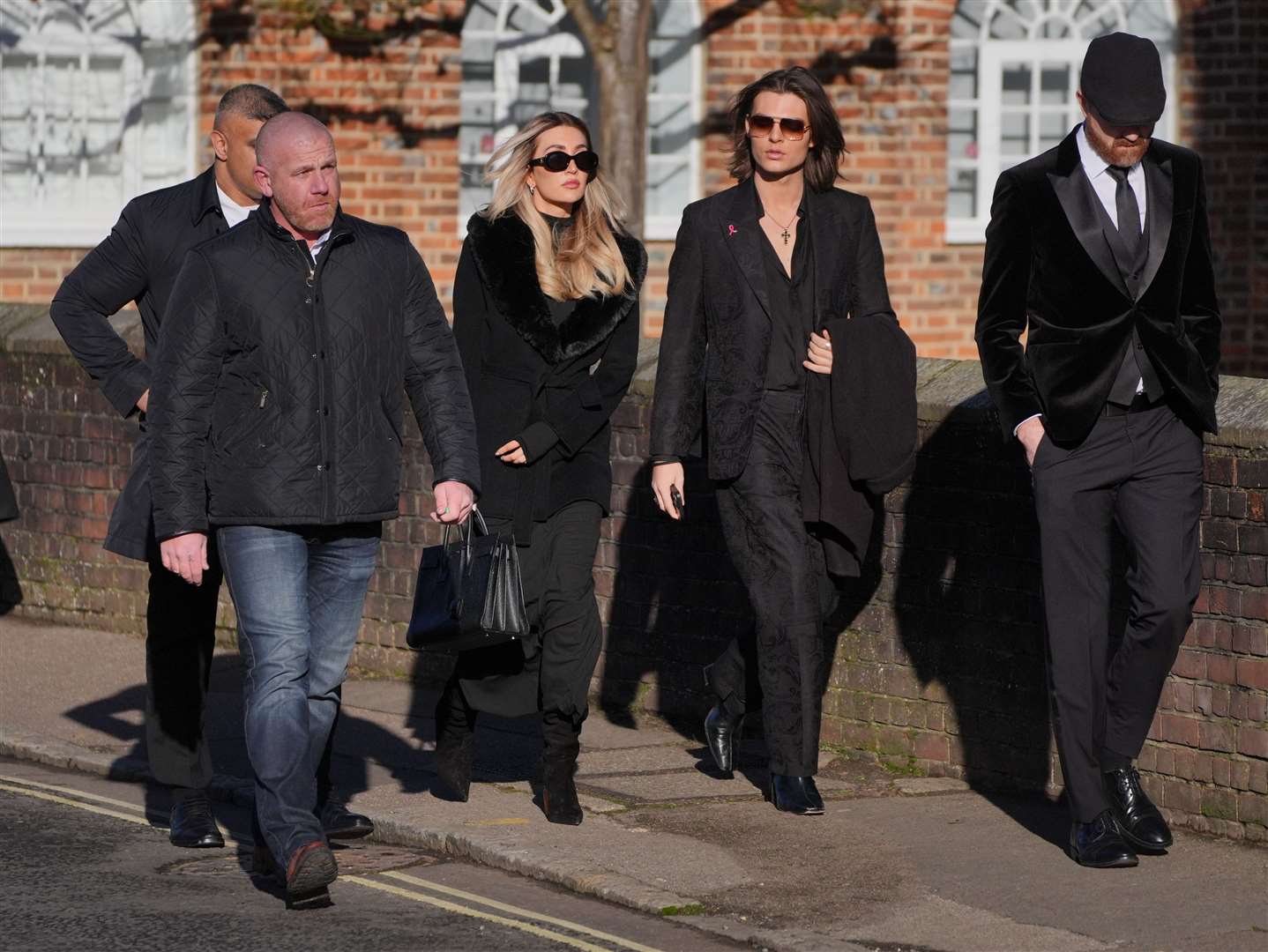 Kate Cassidy and Damian Hurley (second right) arrives for the funeral service of One Direction singer Liam Payne at St Mary’s Church in Amersham, Buckinghamshire (PA)