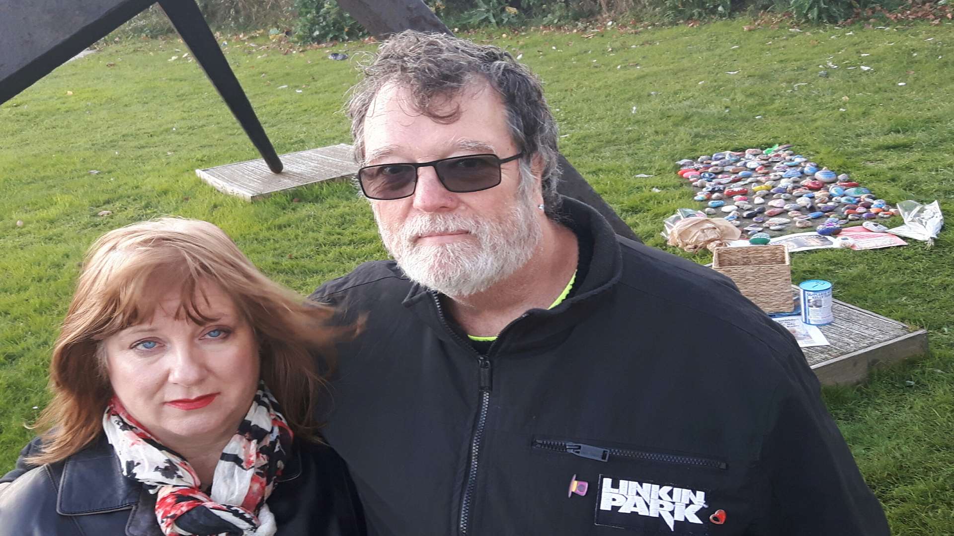 Grieving Linda and Martin Turner with the laid tribute stones