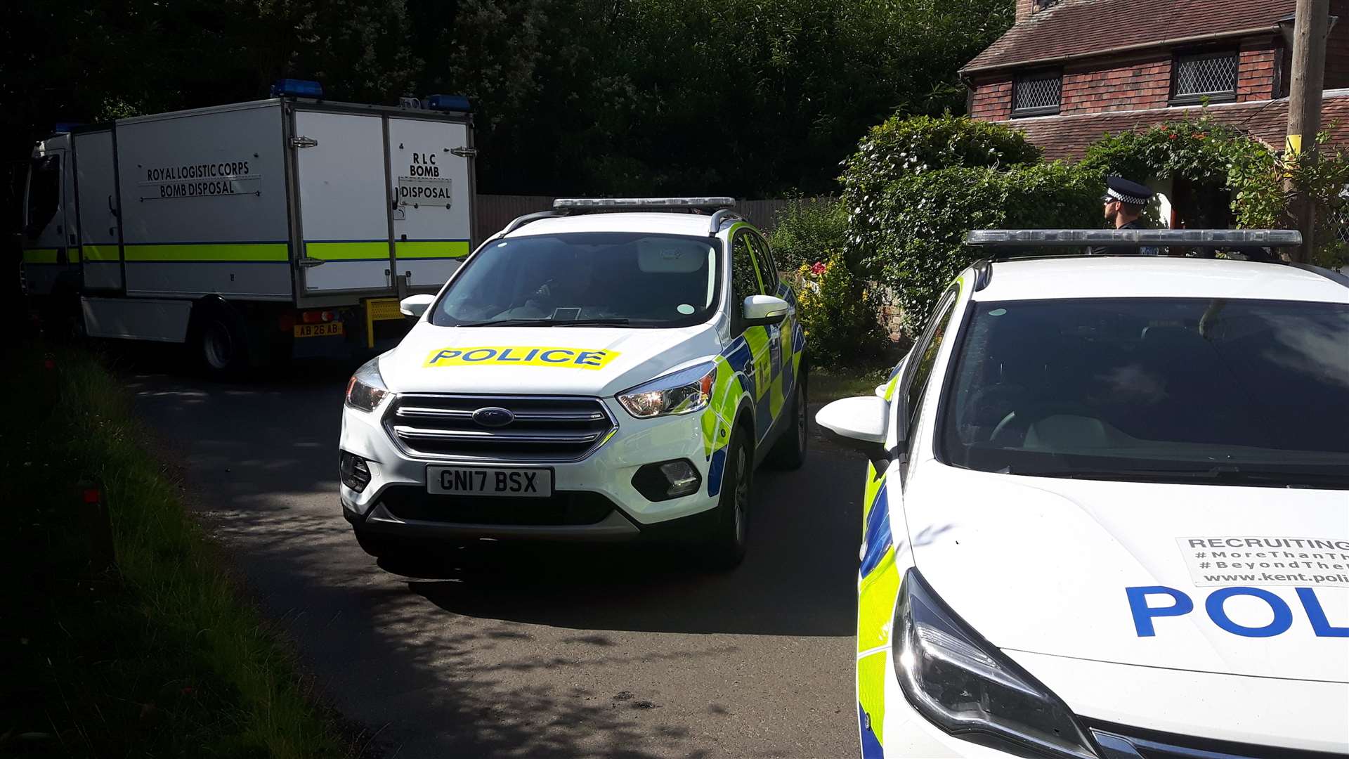 Amsbury Road is currently blocked by police cars and a bomb disposal lorry