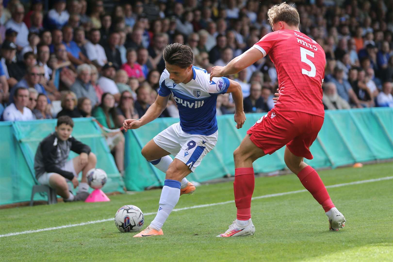 Tom Nichols takes on Accrington defender Brad Hills Picture: @Julian_KPI