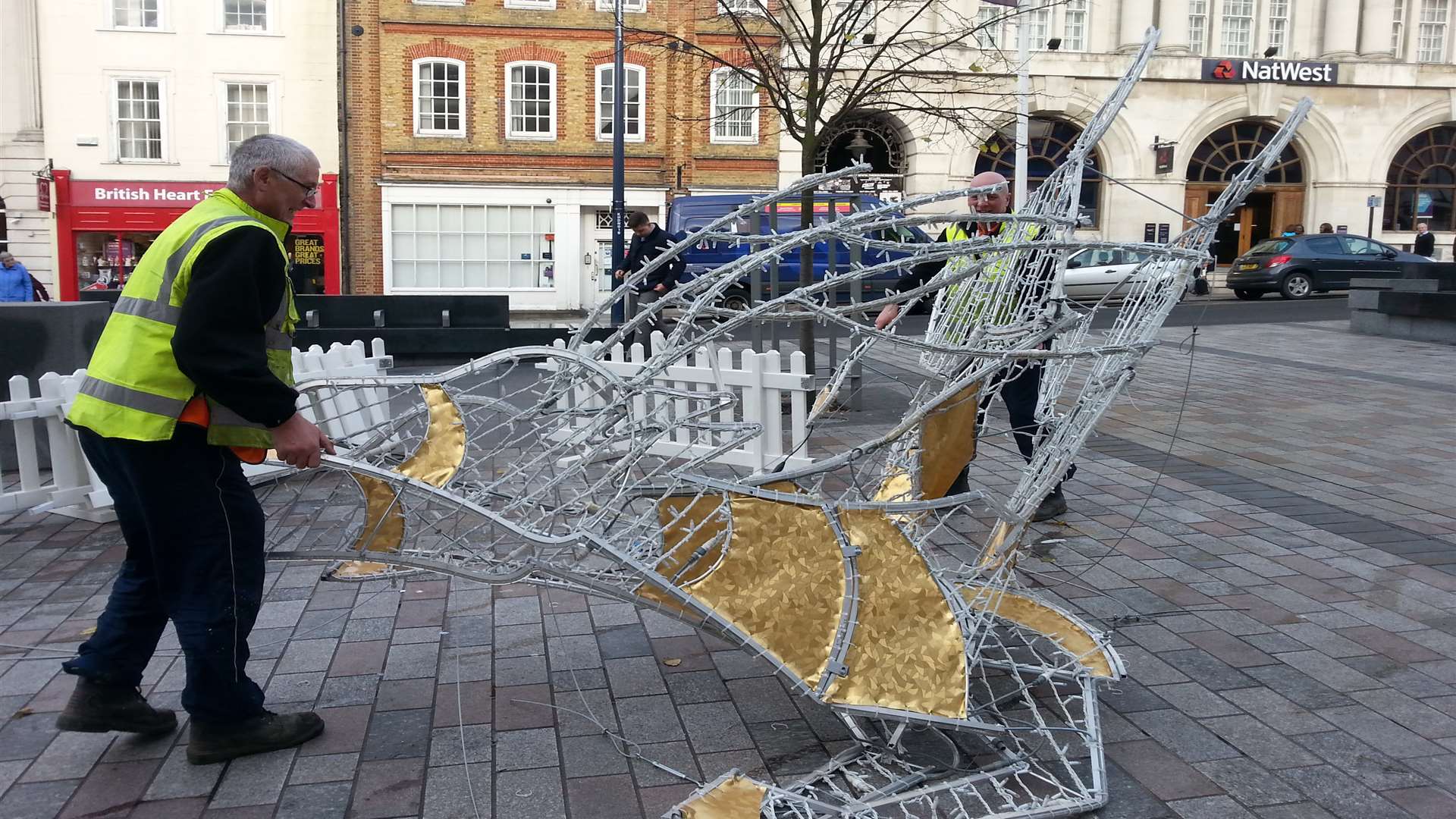 The damaged reindeer is taken away